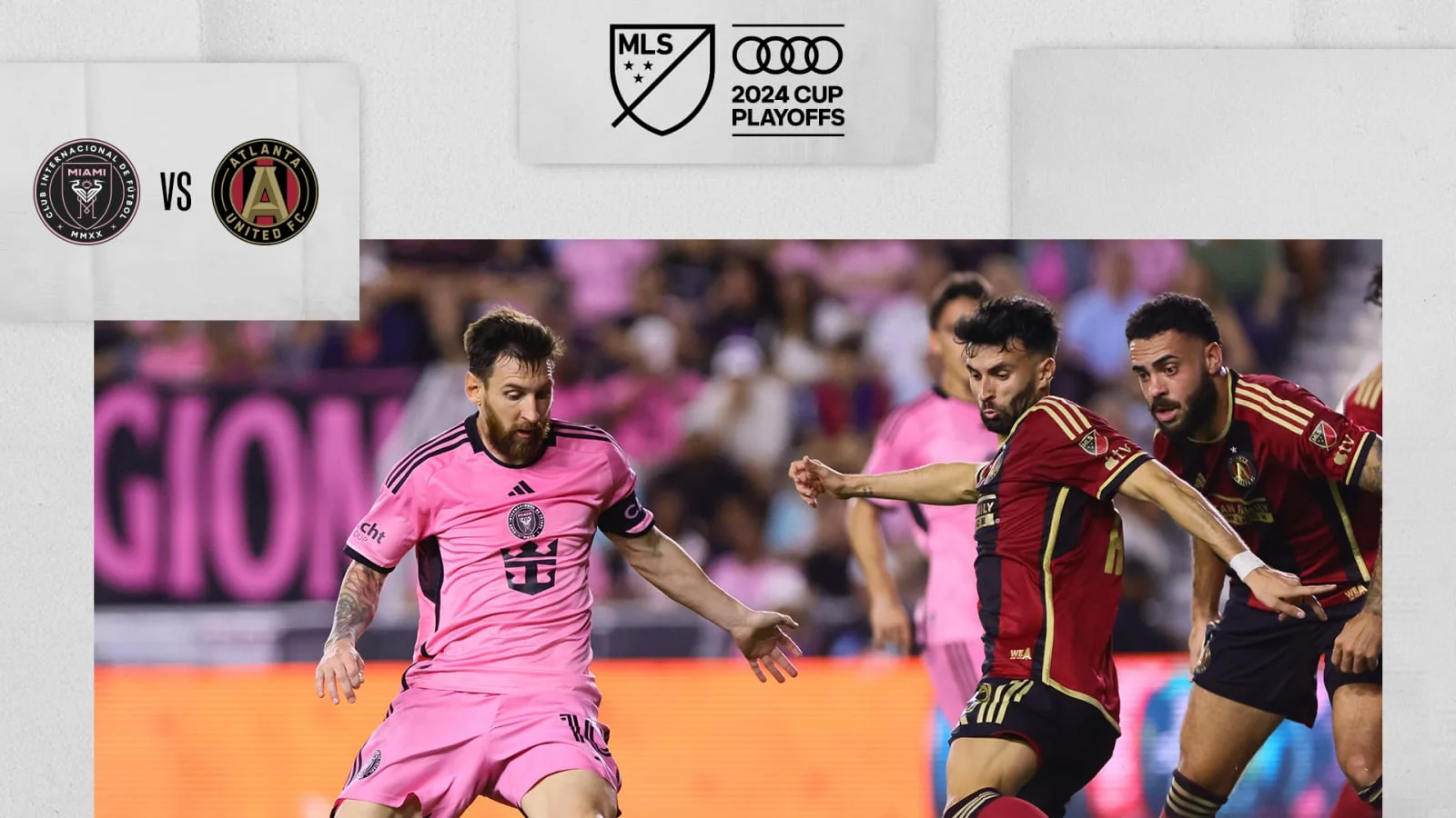 Lionel Messi in Inter Miami pink facing Atlanta United defenders in MLS's 2024 playoff editorial photo
