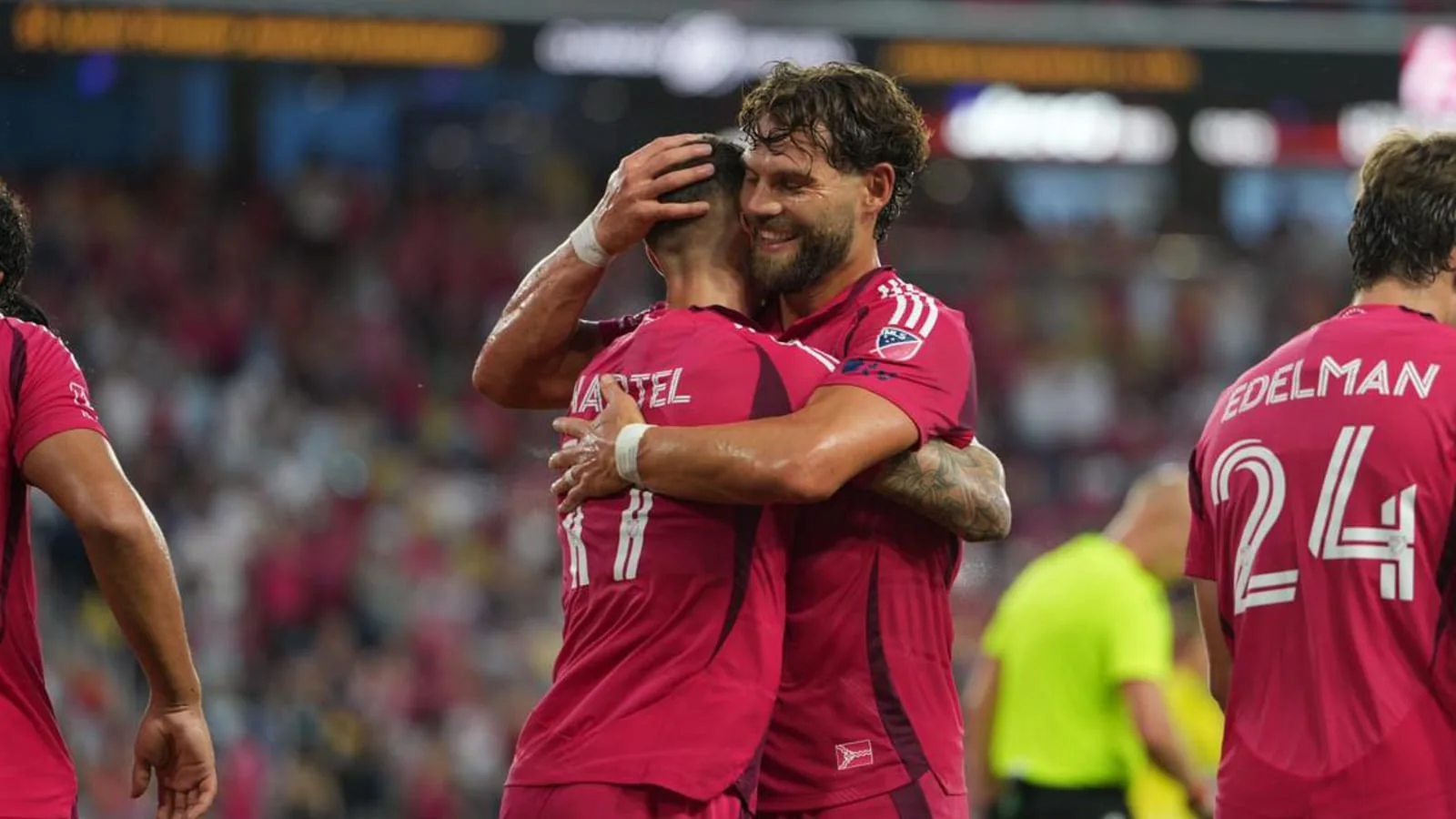 St. Louis CITY SC players celebrate during a 2026 MLS rivalry match against Sporting Kansas City