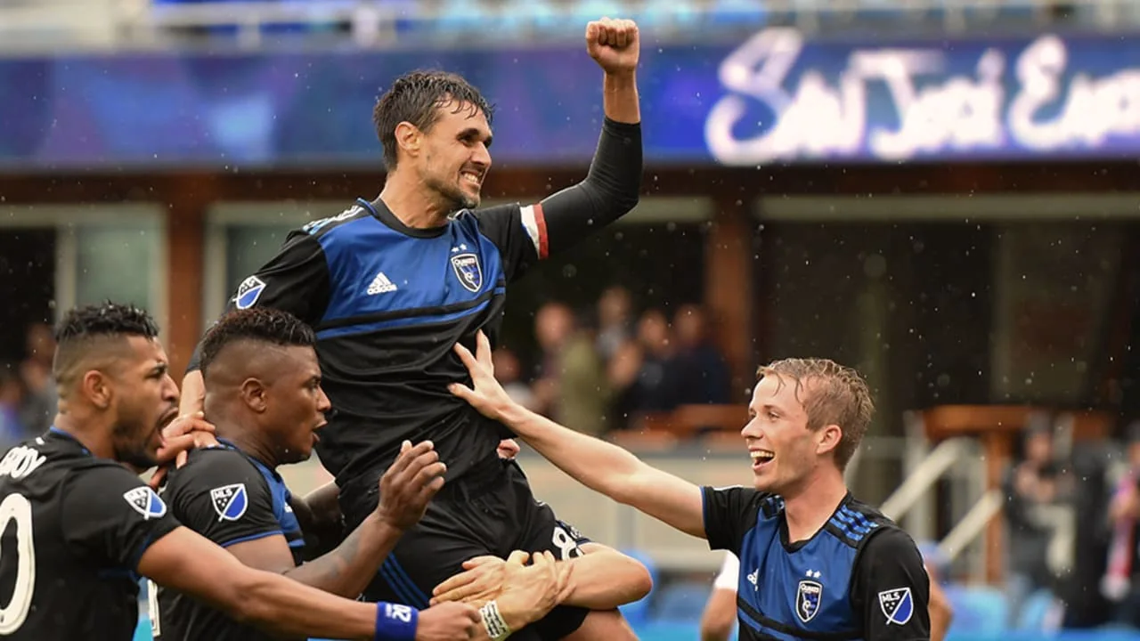 Chris Wondolowski is lifted by San Jose teammates after his four-goal game against Chicago in 2019