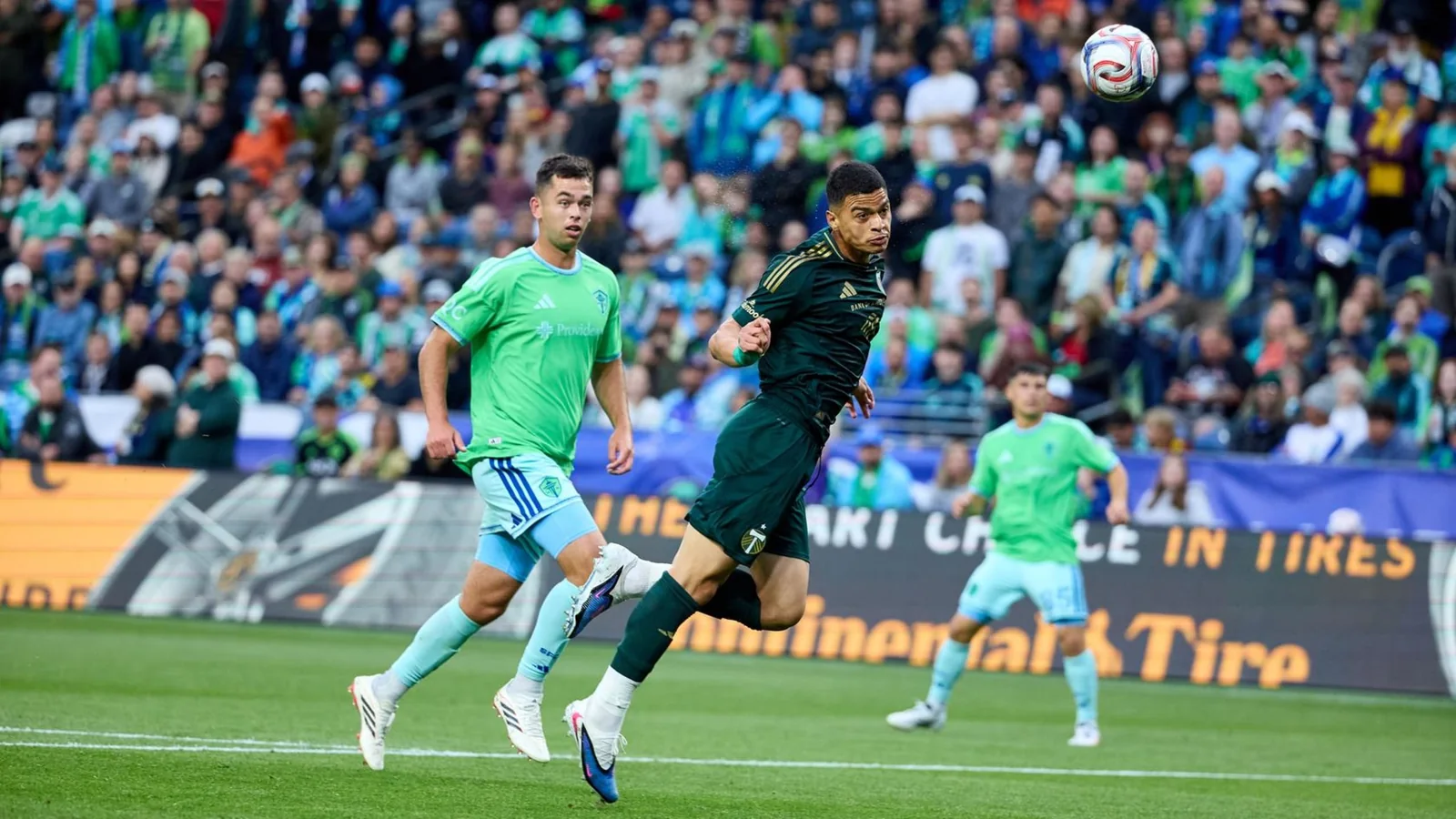 Portland Timbers forward Kevin Kelsy challenges for the ball against Seattle Sounders at Lumen Field in July 2026