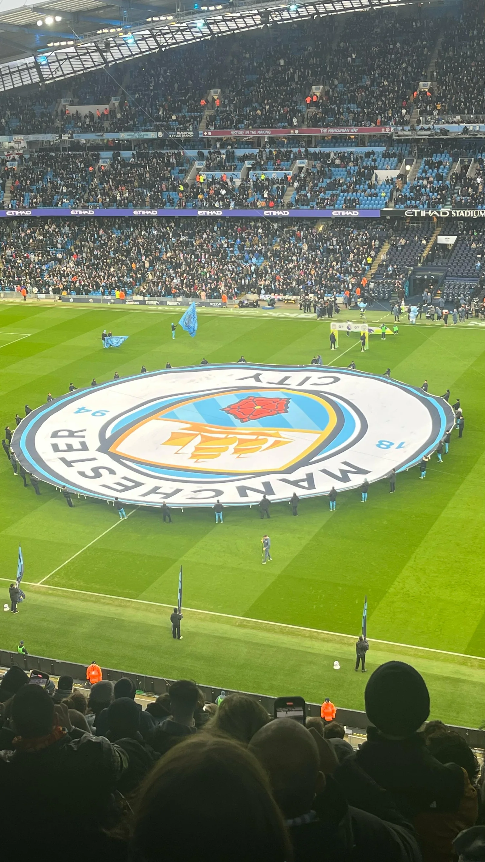 Manchester City and Liverpool players during a Premier League match at the Etihad Stadium